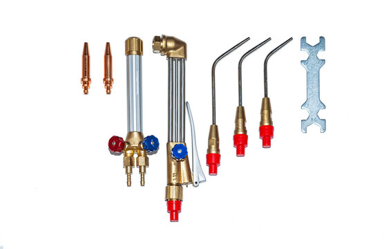 Welding brazing and cutting torch kit. A new set of welding torches for soldering and cutting metal, on a white background.