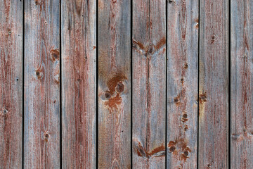 Old rough boards. Red gray wooden planks background.