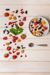 Cereals. Breakfast with muesli and berries. Top view, lying down.