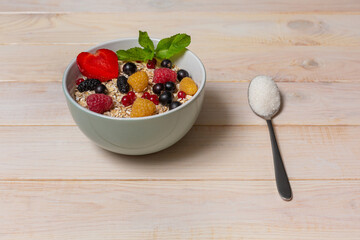 Cereals. Breakfast with muesli and berries. Top view, flat lay.