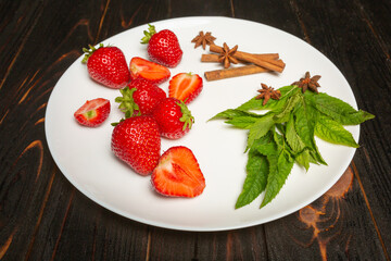 Fresh juicy strawberries with leaves. Strawberry.