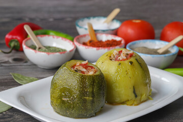 Round zucchini stuffed with vegetables and rice