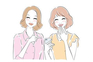 スマホ画面を見て楽しそうな二人のきれいな女性
