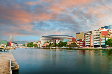 View of Nervion River  in the foreground and Olabeaga neighborhood and San Mames Football club at...