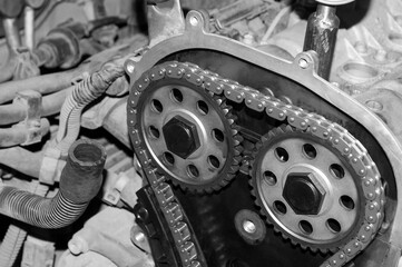 View of the camshaft gears of the timing chain drive of an automobile engine with the front cover...