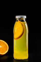 Fototapeta na wymiar Summer refreshing drink without alcohol. Cold orange drink.