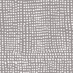 Fototapeta premium Seamless hand drawn pattern with white dots on grey background