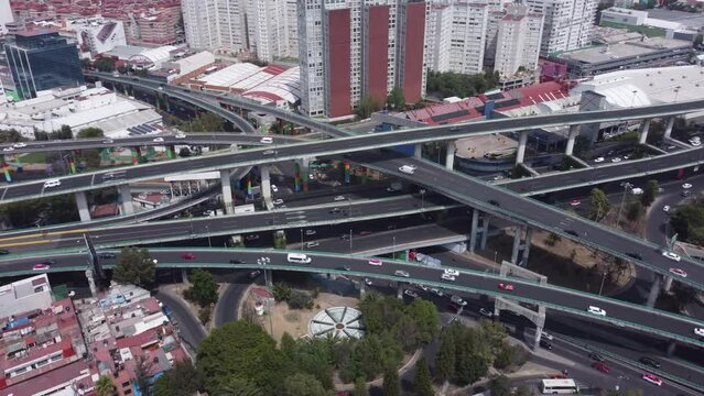 Orbiting aerial view of a highway in Mexico City