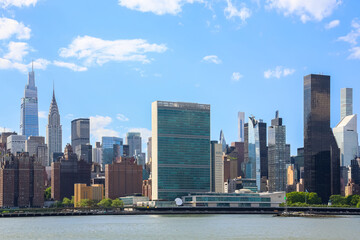 Fototapeta na wymiar The midtown Manhattan skyline panorama in Tudor City including the United Nations Headquarters and several other skyscrapers