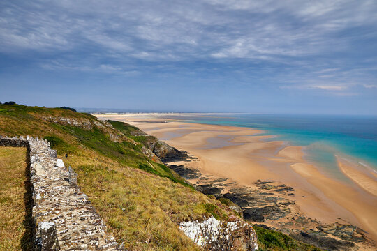 Image of Carteret Plage with the headland in the foreground. Normandy, France.