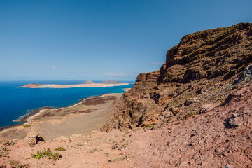 Fototapeta na wymiar View with La Graciosa from Lanzarote. Panorama with La Graciosa island and sea