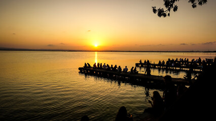 People watching the sunset in the lagoon of Valencia