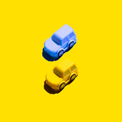 Fototapeta na wymiar Yellow and blue cars. Like the flag of Ukraine