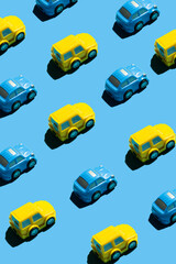 two cars on a yellow background. Concept about Ukraine