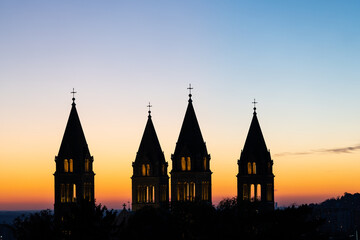Detail of cathedral towers with sunrise