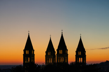 Detail of cathedral towers with sunrise