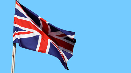 UK, United Kingdom, Union Jack flag waving in sky