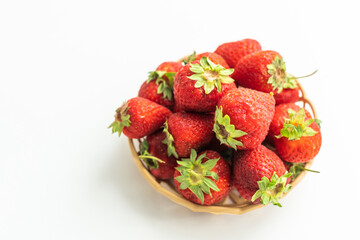 strawberries in a wicker plate
