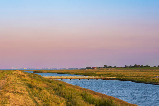 View of the Langwarder Groden/Germany at the North Sea at dusk