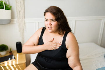Woman with obesity suffering chest pain
