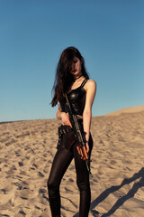 Girl with a gun in her hands