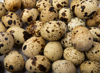 Fototapeta premium Quail eggs background.Organic food. Place for text. Fresh quail eggs.