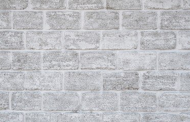 White textured brick wall made of shell rock.Light vintage back.