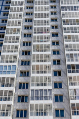 Residential complex, multi-storey residential building - transparent windows of glazed balconies