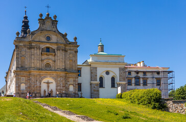 Obraz premium Lysa Gora, Swiety Krzyz mount hilltop with medieval Benedictive Abbey and pilgrimage sanctuary in Swietokrzyskie Mountains near Nowa Slupia village in Poland