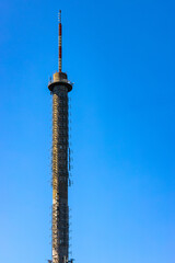 Obraz premium TV and radio transmission tower on top of Lysa Gora, Swiety Krzyz mount in Swietokrzyskie Mountains near Nowa Slupia village in Poland