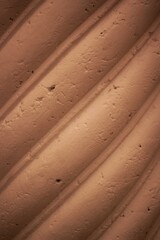 Diagonal lines carved in stone 