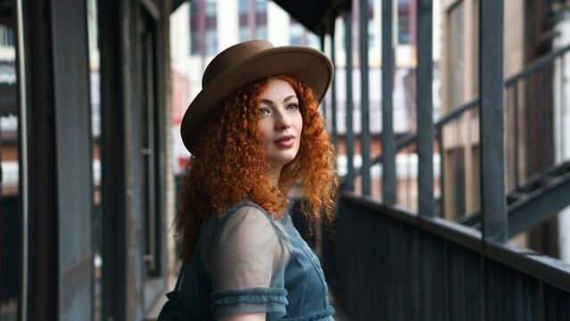 Street portrait girl in hat