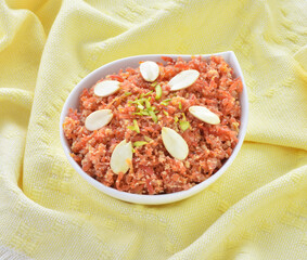 Gajar Halwa or Carrot Pudding. A delicious sweet and healthy dessert prepared by pure milk, desi ghee and fresh carrots.