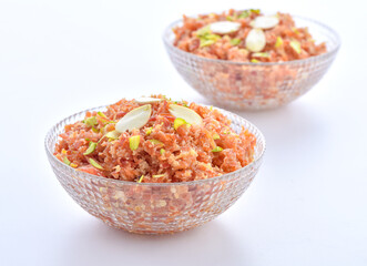 Gajar Halwa or Carrot Pudding. A delicious sweet and healthy dessert prepared by pure milk, desi ghee and fresh carrots.