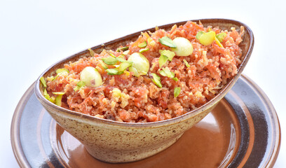 Gajar Halwa or Carrot Pudding. A delicious sweet and healthy dessert prepared by pure milk, desi ghee and fresh carrots.