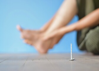 Concept of nail penetrating injury and tetanus.