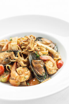 mixed seafood traditional stir fry laksa curry in malaysia