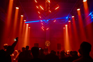 Fototapeta na wymiar people dancing in a nightclub