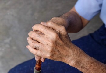 Hand of Asian elder man. Concept of rheumatoid arthritis, osteoarthritis, or joint pain