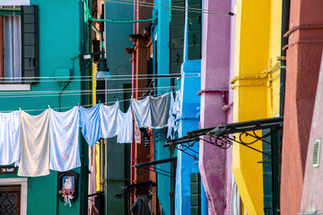 Part view of many houses in various colors