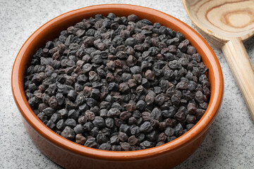Bowl with black chickpea Murgia, ceci nero, also known by the name of cece del solco dritto in Italy