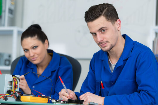 students in electronics class at university