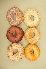 Fresh bagels with sesame and poppy seeds. Variety of assorted New York style Bagels