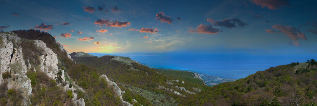 Sunrise panorama of the Black sea coast from Yurkiny skaly, Northern Demerdji, Crimea