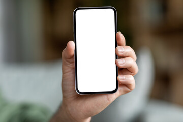 Male Hand Holding Modern Smartphone With Big Blank White Screen