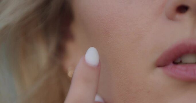 Closeup face of beautiful blond smiling woman. Gorgeous woman with attractive appearance