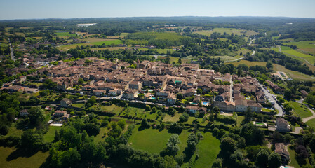 Wide drone shot of the village of Monpazier in Périgord