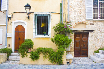 Fototapeta na wymiar Picturesque architecture of the Old Town in Antibes, France 