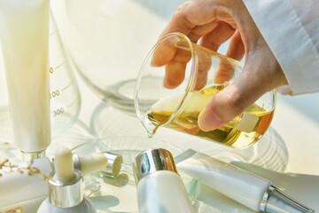 Scientist mixing natural skin care beauty products, Organic botany extraction and scientific...