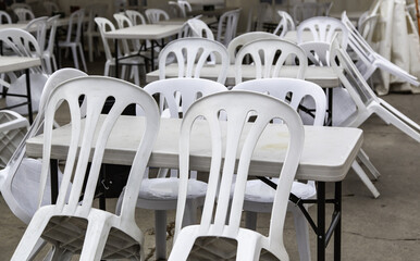 Plastic chairs on a terrace